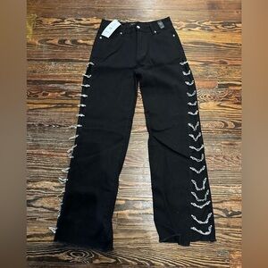 AKIRA NWT Black rhinestone open side jeans